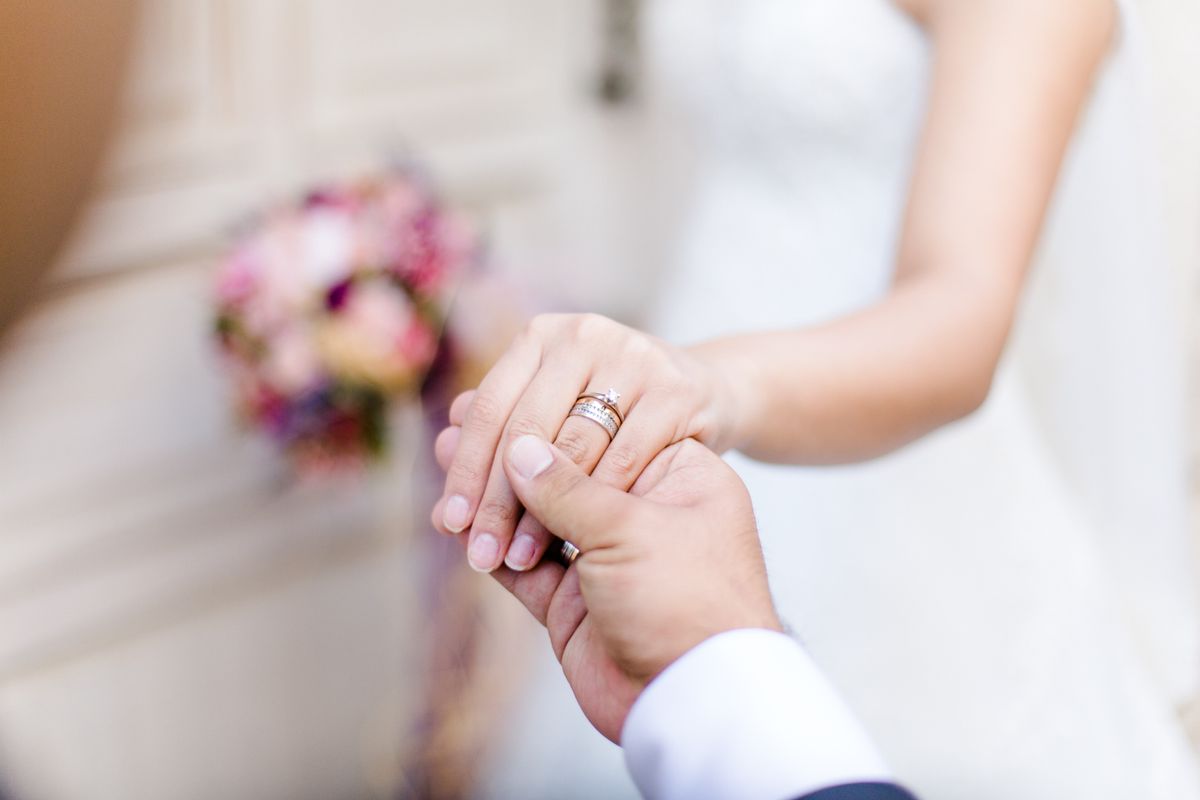 Wedding rings and bouquet