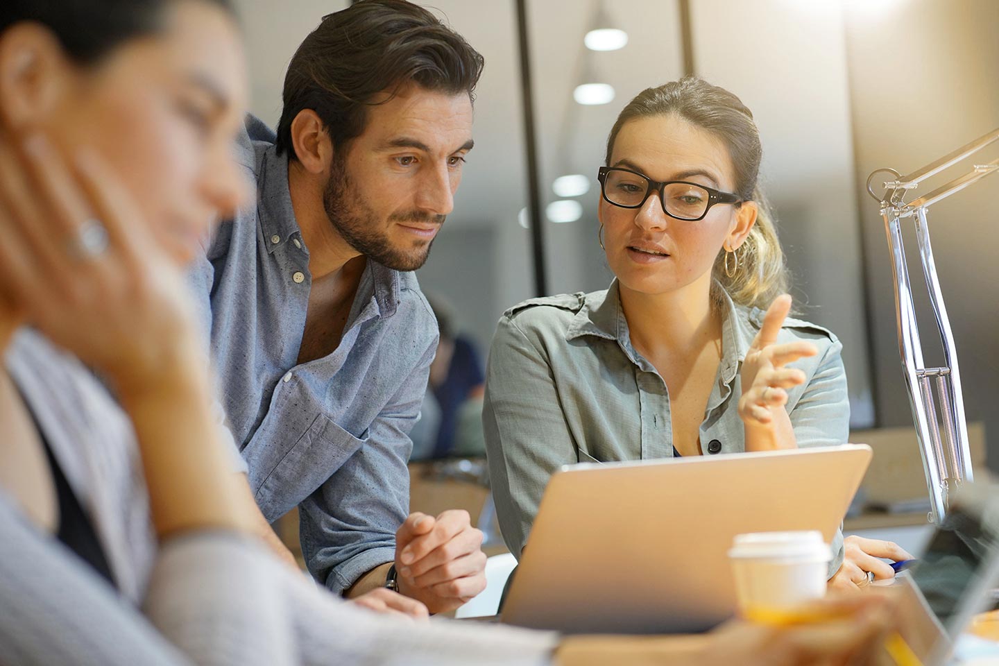 A multifamily marketing team reviewing PPC campaign performance