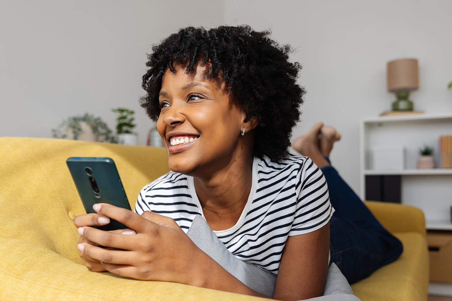 A renter browsing social media on a phone